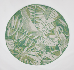 Round green and white leaf-patterned rug